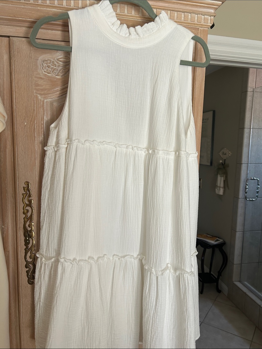 Pomander Place Cream Ruffle Neck Sleeveless Top